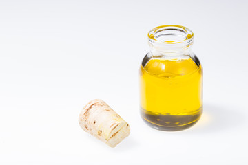 bottle with natural oil, isolated on white background