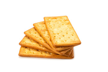 Cracker with salt isolated on white.