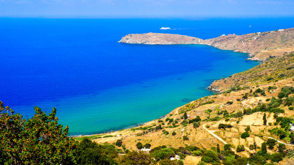 Naklejka na ściany i meble Palaiopolis beach is the largest on the island of Andros in the heart of Egean Sea. It is located between the village of Avlemonas and the colony of Skandia