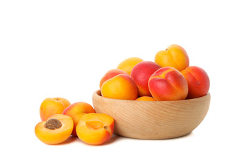 Bowl with fresh apricots isolated on white background