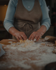 grandmother prepares fresh homemade pasta