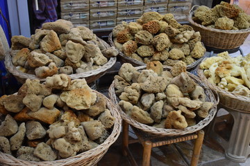 Sea sponges on market stalls for sale as souvenir