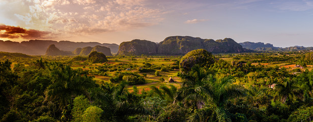 Panorama of Viñales mountains and valley, Cuba. Photo panoramic during sunset at a high point overviewing valley.