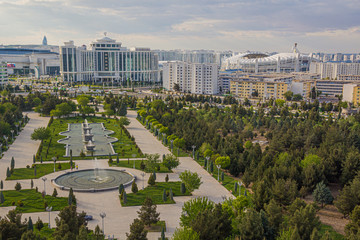 Independence park and new marble-clad buildings in Ashgabat, Turkmenistan - obrazy, fototapety, plakaty