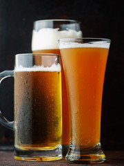 three different beer glasses
