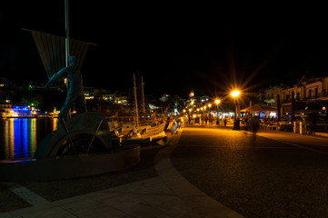 Night time image of the old harbour, Skiathos old town, Greece.