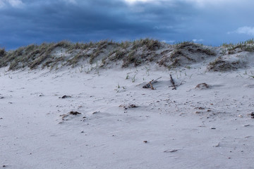 View of the sandy shore of the Parnu bay in evening. It a bay in the northeastern part of the Gulf of Livonia (Gulf of Riga of Baltic Sea), in southern Estonia.