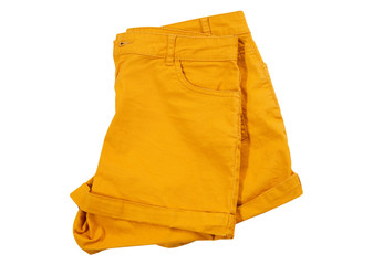 Folded orange shorts in isolation mockup background - summer fashion clothes