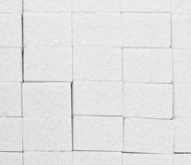 Fototapeta premium Pieces of white sugar close up