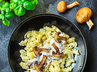 pasta creste di galla sauce with mushrooms and cream Menu concept healthy eating. food background top view copy space