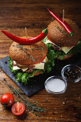 beef burgers on a stone Board close up