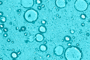 oil spill on blue background abstract