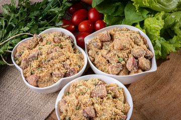 Brazilian farofa. Made from manioc flour, bacon and sausage.