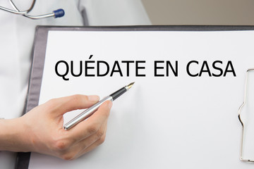 the word spanish Quédate en casa 