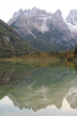 Reflection of the mountain in the Dolomites at autumn 