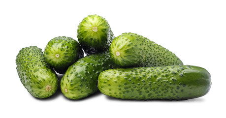 Pile of fresh cucumbers isolated on white background. Farming concept.