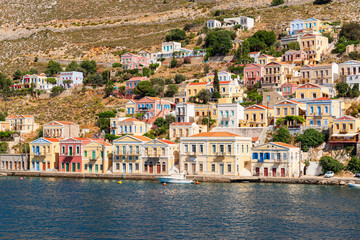 Colorful houses on the hillside of the island of Symi. Greece