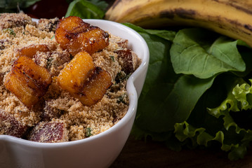 Brazilian banana farofa. Made from manioc flour, bacon, banana and sausage.