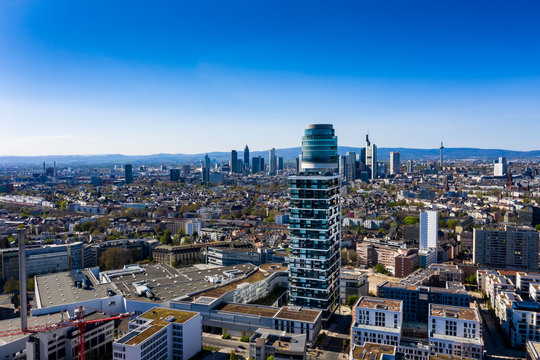 Germany, Hesse, Frankfurt, Helicopter view of Neuer Henninger Turm and surrounding downtown buildings