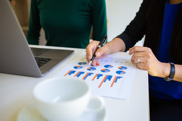 Hand women Writing tax on desk about at home office.business concept