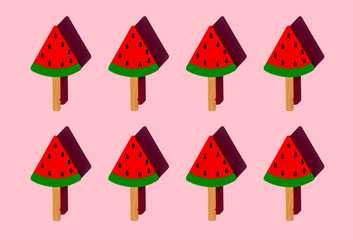 Rows of popsicle sticks with toy watermelon slices