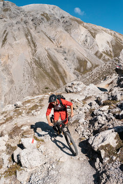 Man riding on mountainbike, Munestertal Valley, Grisons, Switzerland
