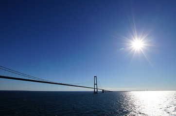Fototapeta premium Storebæltsbroen - Bridge across the Great Belt in Denmark, third largest suspension bridge in the world by span