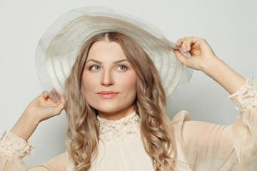 Cheerful woman on white background, beautiful female face