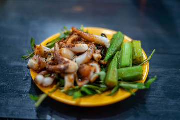 Exotic bizzare street food - grilled frog, lobster, octopus in Vietnam