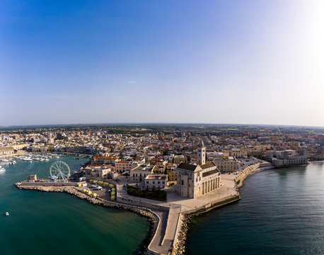Italy, Province of Barletta-Andria-Trani, Trani, Helicopter view of clear sky over coastal city in summer