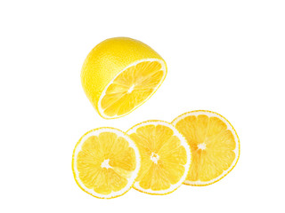 Bright juicy lemon on a white background with three round slices.