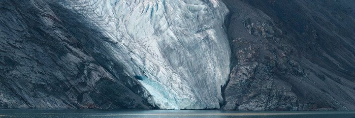 Panorama image of glacier fingers coming down to seashore, Nunavut and Northwest Territories, Canada, North America