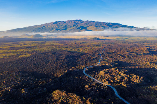 Aerial view of volcanic landscape and Mauna Kea, 4207m, Big Island, Hawaii, United States of America, North America
