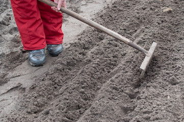 rakes in the garden loosen the ground