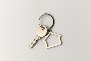 Macro view of silver key on the white background