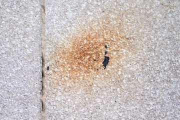  rusty spot on a concrete pavement