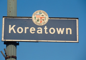 A city sign that says Koreatown