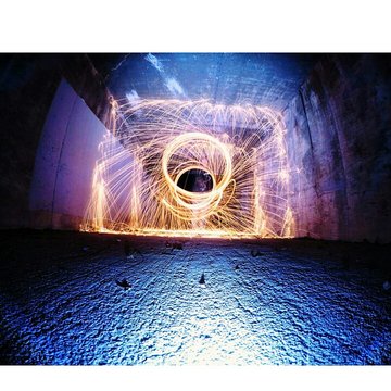 Man Spinning Wire Wool In Tunnel