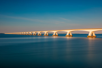 Long exposure of the Zeeland Bridge in Zierikzee, Zeeland province, Netherlands around sunset. With a total length of over 5 km it is the longest bridge in The Netherlands.