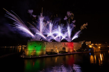 Fireworks set on fire from the Aragonese castle of Taranto