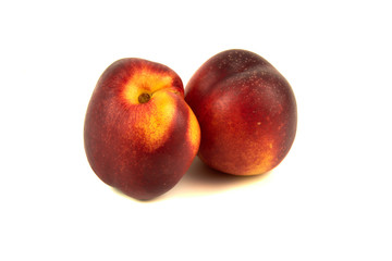 Fototapeta na wymiar Fresh fruit Nectarine peaches isolated on white background