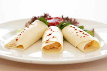 these are cold appetizers on a plate