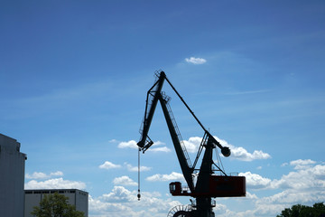 Crane in an industrial port on the Danube in Bavaria photographed in spring