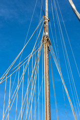 Pulleys, ropes, and mast of an old sailing yacht