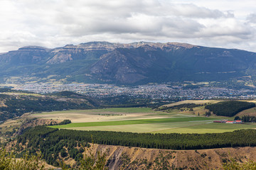 Fototapeta na wymiar View of mountains and the city of Coyhaique, Aysén, Chile