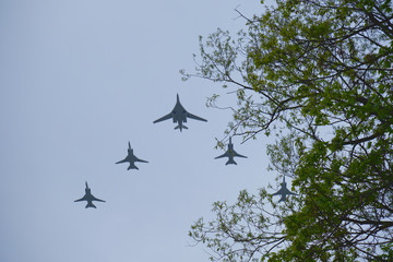 Russian military aircraft flies over the city