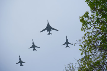 Russian military aircraft flies over the city