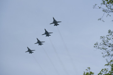 Russian military aircraft flies over the city