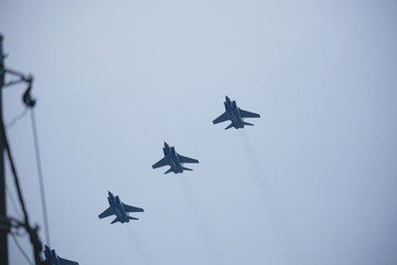Russian military aircraft flies over the city