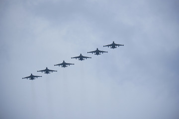 Russian military aircraft flies over the city